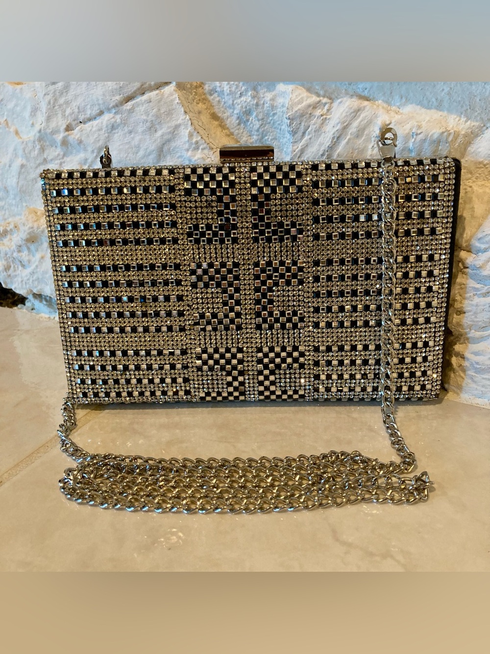 NWOTUnbranded structured evening clutch covered in silver and black rhinestones